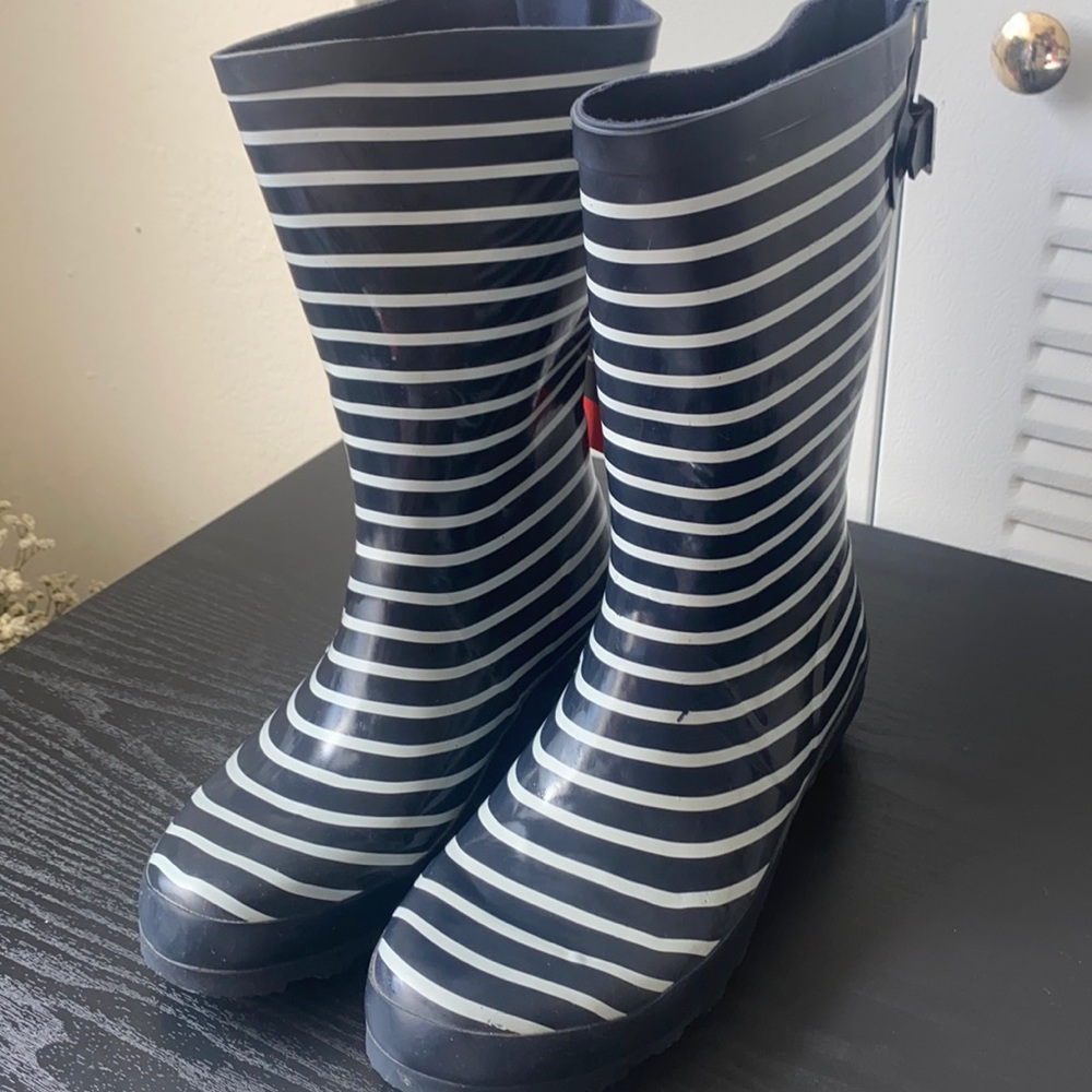 Blue and white rain boot. Water proof , not used .  Storm by Cougar